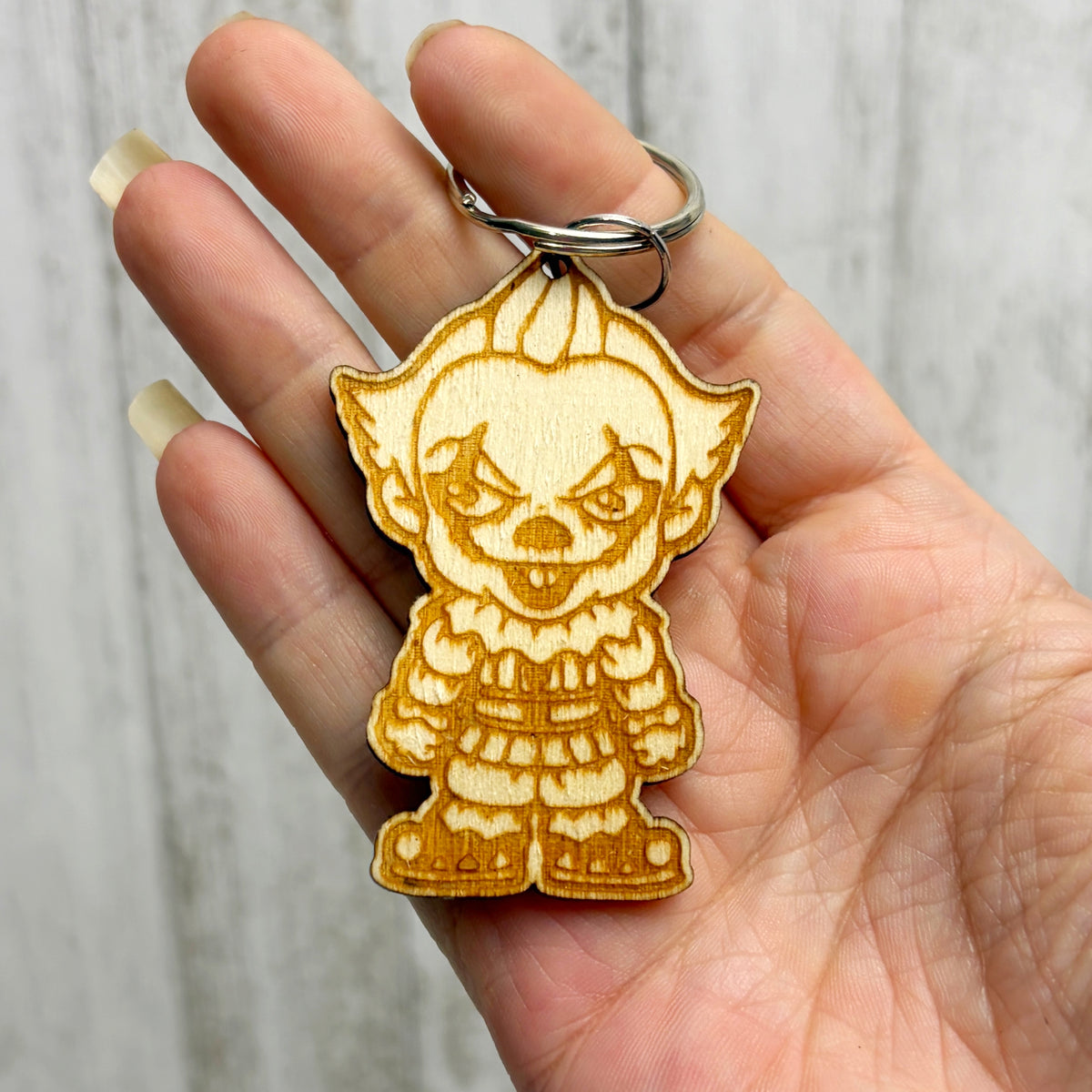 Pennywise Serial Killer Wooden Keychain